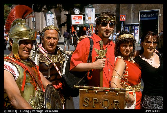 Roman Legionnaires pose with tourists, Roman Forum. Rome, Lazio, Italy (color)