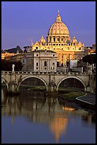 Bridge and Basilic Saint Peter reflected in Tiber River, sunrise. Vatican City