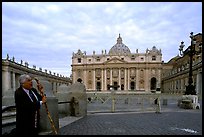 Pilgrim prays in front of the Basilic Saint Peter. Vatican City ( color)