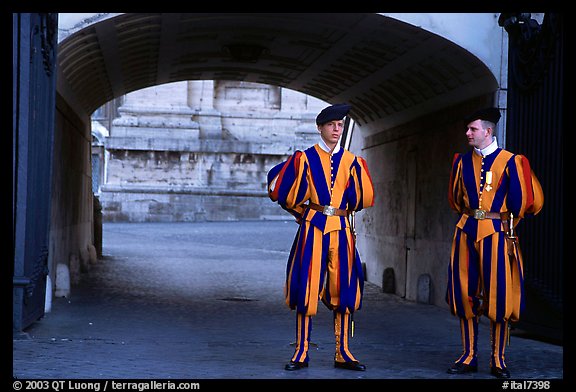 Swiss guards in blue, red, orange and yellow  Renaissance uniform. Vatican City