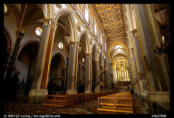 Church interior looking down the nave to the apse. Naples, Campania, Italy