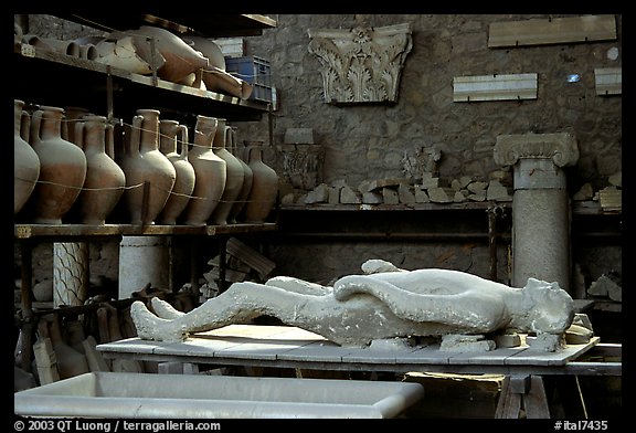 Artifacts found during the excavations, including a petrified man. Pompeii, Campania, Italy (color)