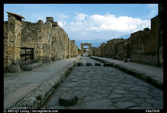 Street with roman period pavement and sidewalks. Pompeii, Campania, Italy (color)