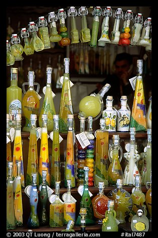 Bottles of Lemoncelo, the local lemon-based liquor, Amalfi. Amalfi Coast, Campania, Italy