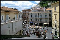 Plazza with wedding party seen from the stairs of Duomo Sant'Andrea, Amalfi. Amalfi Coast, Campania, Italy