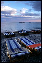 Beach chairs on Spiaggia del Fornillo at sunset, Positano. Amalfi Coast, Campania, Italy (color)