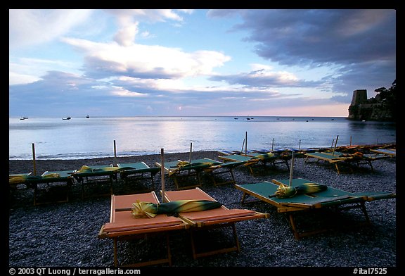 Beach chairs at sunset, Positano. Amalfi Coast, Campania, Italy