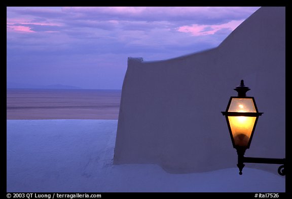 Lamp, White walls, pastel colors of sunset, Positano. Amalfi Coast, Campania, Italy