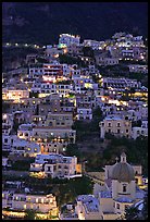 Houses on steep hill at sunset, Positano. Amalfi Coast, Campania, Italy