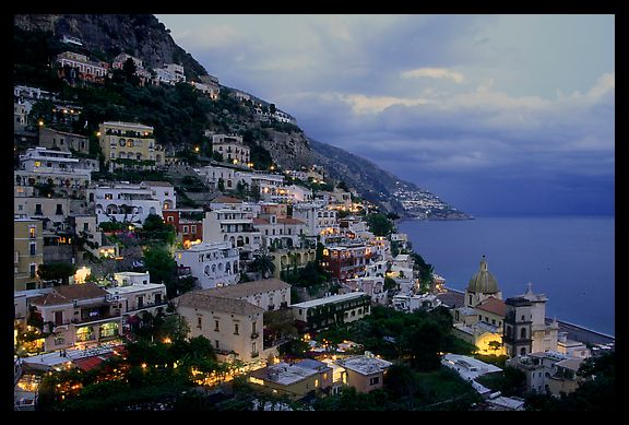 Positano lights coming up at dusk. Amalfi Coast, Campania, Italy (color)