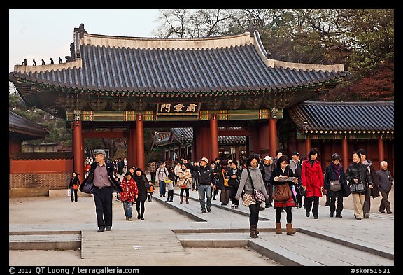 People walking down gate, Changdeok Palace. Seoul, South Korea