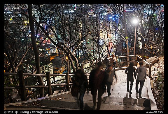 People on Namsan stairs by night. Seoul, South Korea (color)