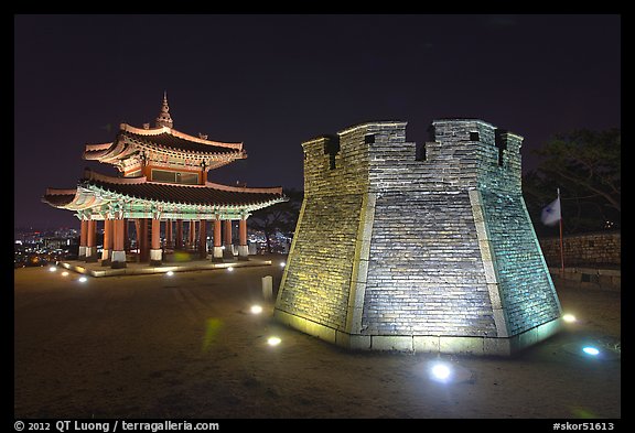 Crossbow tower and command post at night,  city lights, Suwon. South Korea