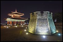 Crossbow tower and command post at night,  city lights, Suwon. South Korea (color)