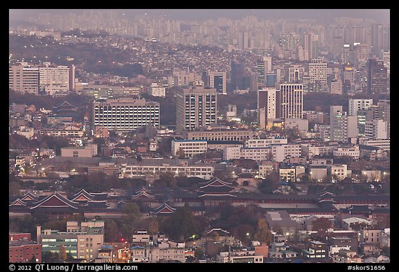 Gyeongbokgung and high-rises at dusk. Seoul, South Korea (color)