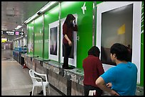 Photography exhibit being installed in subway. Daegu, South Korea ( color)