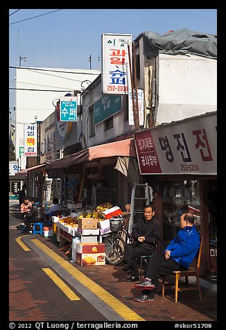 Shopkeepers and storefronts. Daegu, South Korea (color)