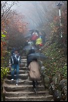 Blurred tourists on rainy day, Seokguram. Gyeongju, South Korea