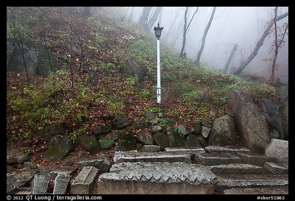 Stones and lantern in fog, Seokguram. Gyeongju, South Korea (color)