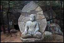 Seated stone Yeora buddha statue, Namsan Mountain. Gyeongju, South Korea (color)