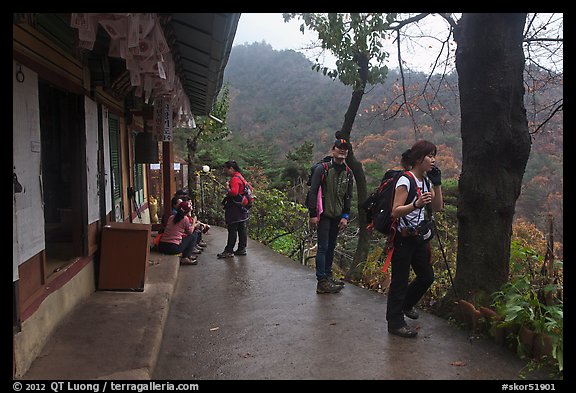 Hikers at Sangseonam hermitage, Samneung Valley, Mt Namsan. Gyeongju, South Korea (color)