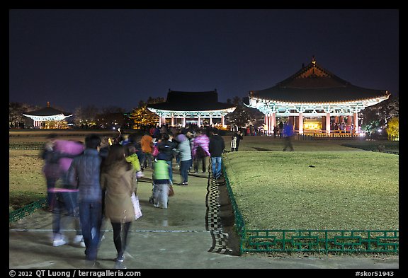 Crowd visiting Anapji Pond at night. Gyeongju, South Korea (color)