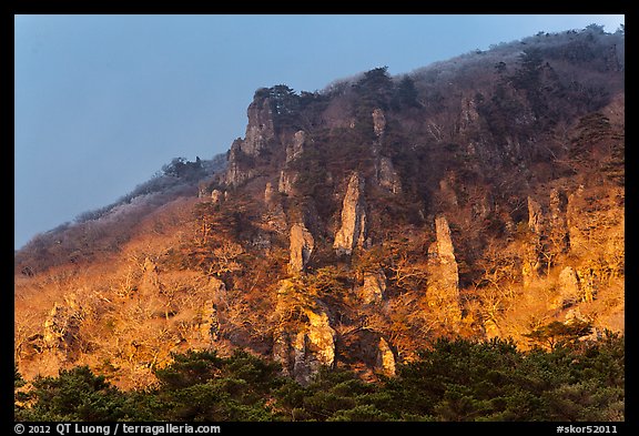Last light on pinnacles. Jeju Island, South Korea (color)