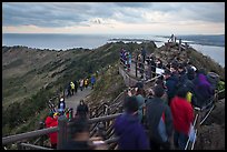 Tourists on top of Seongsang Ilchulbong. Jeju Island, South Korea