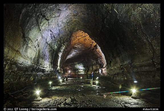 Manjanggul Lava cave with visitor standing. Jeju Island, South Korea (color)