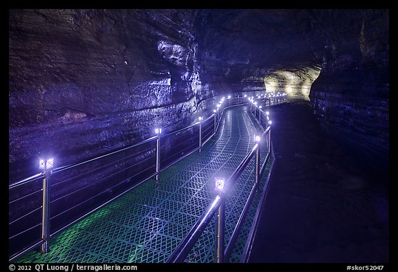 Walkway in Geomunoreum cave with world heritage logos. Jeju Island, South Korea (color)