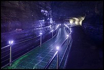 Walkway in Geomunoreum cave with world heritage logos. Jeju Island, South Korea