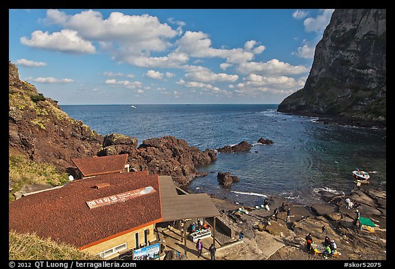 Cove and Haeneyo house, Seongsang Ilchulbong. Jeju Island, South Korea (color)