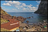 Cove and Haeneyo house, Seongsang Ilchulbong. Jeju Island, South Korea (color)