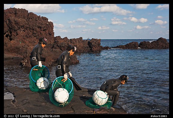 Old Haeneyo women preparing for dive. Jeju Island, South Korea (color)