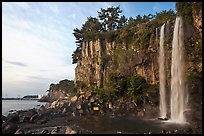 Jeongbang Pokpo, only waterfall in Asia dropping into sea, Seogwipo. Jeju Island, South Korea ( color)