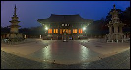 Frontal view of main hall and two pagodas at night, Bulguksa. Gyeongju, South Korea (color)