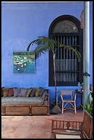 Chairs and blue wall, Cheong Fatt Tze Mansion. George Town, Penang, Malaysia ( color)