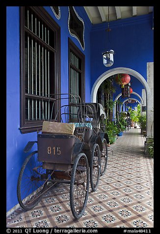 Rickshaws in front gallery, Cheong Fatt Tze Mansion. George Town, Penang, Malaysia (color)