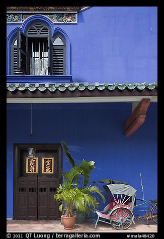 Window, door, and trishaw, Cheong Fatt Tze Mansion. George Town, Penang, Malaysia (color)