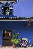 Window, door, and trishaw, Cheong Fatt Tze Mansion. George Town, Penang, Malaysia