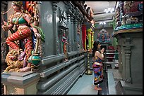 Woman worshipping at Sri Mariamman Temple. George Town, Penang, Malaysia