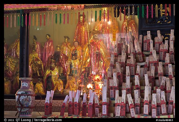 Statues and sticks, Kuan Yin Teng temple. George Town, Penang, Malaysia (color)