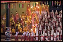 Statues and sticks, Kuan Yin Teng temple. George Town, Penang, Malaysia (color)