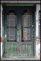 Old green door locked with chain. George Town, Penang, Malaysia ( color)