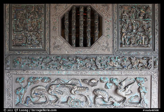 Octogonal window and stone carvings, Khoo Kongsi. George Town, Penang, Malaysia (color)