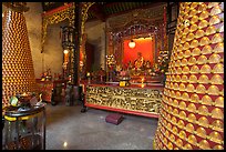 Wishing wheels and altar, Hainan Temple. George Town, Penang, Malaysia