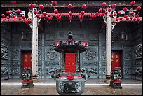 Slate and crimson facade, Hainan Temple. George Town, Penang, Malaysia