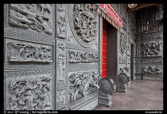 Carved stone walls, Hainan Temple. George Town, Penang, Malaysia