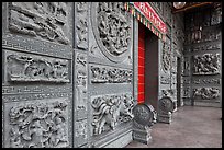 Carved stone walls, Hainan Temple. George Town, Penang, Malaysia (color)