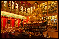 Buddha image inside Yellow Hat Buddhist temple. George Town, Penang, Malaysia (color)